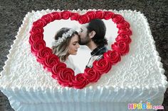 a heart shaped cake with two people in it