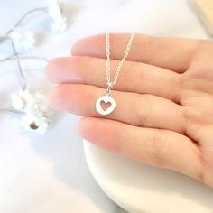 Beautiful handmade open heart pendant necklace in 925 sterling silver. Perfect to give to any woman or girl. It is a perfect gift for Valentine's Day, Birthday, Anniversary, Bridesmaid, Best Friends, Christmas, Mother's Day. Dress up your best outfit and wear this beautiful necklace. ♥Details: Metal type: Sterling silver Karat / purity: 925 Dimensions Charm: 14 x 8mm Dimensions Circle: 8mm x 8 mm ♥ Packaging: All jewels come in a beautiful package with a bow, ready to give away. Dimensions: 3.50 Heart Charm Necklace For Gifts, Minimalist Round Jewelry With Heart Charm, Tiny Silver Necklaces For Mother's Day, Heart Cut Jewelry With Heart Charm For Valentine's Day, Tiny Sterling Silver Charm Necklaces For Anniversary, Tiny Silver Necklace For Mother's Day, Tiny Sterling Silver Charm Necklace For Anniversary, Dainty Adjustable Double Heart Necklace, Minimalist Adjustable Charm Necklace With Heart Pendant