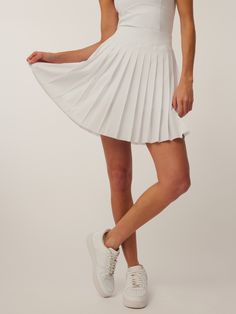 Women's Skirts: Leo Skirt Chic Mini Skort For Tennis, Spring Tennis Dress With Lined Skirt, Spring Tennis Dress With Lined Short Skirt, Spring Short Tennis Dress With Lined Skirt, Chic Fitted Tennis Skort, Chic Fitted Skort For Tennis, Solid Color Summer Tennis Skirt With Pleated Hem, Solid Color Pleated Tennis Skirt For Summer, Short Tennis Dress With Lined Skirt