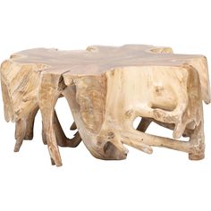 a wooden table that has been made out of tree branches and is shaped like an elephant's trunk