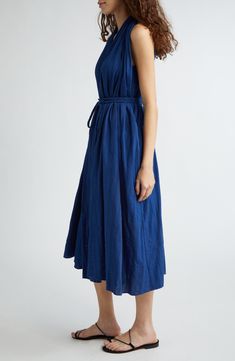 Serve up casual-chic vibes in this sleeveless midi dress framed by a racerback and cinched by a removable robe belt. Slips on over head Deep V-neck Sleeveless Side-seam pockets 100% cotton Dry clean Imported Sleeveless Belted Midi Dress For Casual Occasions, Sleeveless Belted Midi Dress For Casual Wear, Chic Sleeveless Belted Dress For Daywear, Casual Belted Sleeveless Midi Dress, Belted Summer Midi Dress For Daywear, Sleeveless Midi Dress With Tie Waist For Dress Down, Sleeveless Midi Dress With Tie Fastening, Summer Belted Midi Dress For Daywear, Sleeveless Midi Dress With Tie Waist