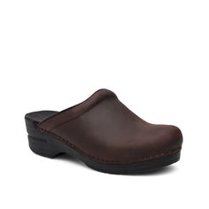 Dansko-Sonja Clog The Sonja clog by Dansko is all you need to look and feel good. Oiled leather, airy single-density open synthetic foam sockliner, contoured midsole and supportive sole make this stapled clog a must-have. Classic Slip-on Clogs With Arch Support, Leather Clogs With Slip-resistant Round Toe, Classic Closed Toe Clogs With Ortholite Insole, Classic Leather Clogs With Ortholite Insole, Closed Toe Synthetic Mules With Arch Support, Comfortable Leather Clogs With Ortholite Insole, Classic Leather Clogs With Arch Support, Brown Synthetic Clogs With Arch Support, Slip-on Synthetic Clogs With Leather Footbed