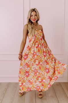 - This gorgeous dress is a floral fantasy! - Unlined material with a colorful abstract floral print - A scoop neckline - Adjustable spaghetti straps - A smocked back detail - A flowy yet flattering silhouette that ends in a midi length hemline Multicolor Printed Sundress For Brunch, Multicolor Floral Print Sundress For Brunch, Summer Multicolor Sundress With Smocked Back, Multicolor Flowy Maxi Dress With Spaghetti Straps, Bohemian Sundress For Garden Party With Smocked Back, Bohemian Sundress With Smocked Back For Garden Party, Multicolor Smocked Bodice Sundress For Brunch, Flowy Multicolor Maxi Dress With Spaghetti Straps, Flowy Square Neck Sundress For Vacation