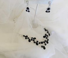 "Black Bridal jewelry set, Black , Silver Necklace with Earring, wedding jewelry set, Bridesmaid Crystal Rhinestone Jewelry, Teardrop Crystal Floral Rhinestone Necklace Color : Black, Silver Necklace Size : 14\" + 5.5\" L Decor Size : 1.5\" L Earring Size : 1.75\" L Please contact us for any special custom order ." Earring Wedding, Wedding Jewelry Set, Bridal Jewelry Set, Black Bridal, Necklace Size, Rhinestone Jewelry, Wedding Jewelry Sets, Bridal Jewelry Sets, Rhinestone Necklace