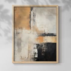 an abstract painting hangs on the wall