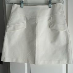 Zara Mini Skirt Lying Flat Measures Hip To Hip 14” Across And Hem To Hem 17” Long. Pockets Are Detail Only With Zippered Side Closure. White Relaxed Skort With Pockets, White Fitted Mini Skirt With Pockets, Fitted White Mini Skirt With Pockets, White High Waist Mini Skirt With Pockets, Chic White Mini Skirt With Pockets, Chic Skirted Skort With Pockets, White Mini Skort For Workwear, White Mini Skirt With Pockets For Work, White Pencil Skirt With Pockets