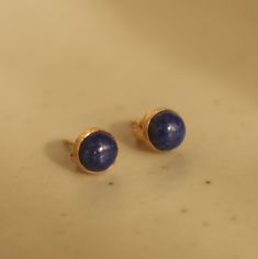 📫 Vacation Announcement Cute little stud earrings with a beautiful lapis gemstone in 14k gold filled setting The waterproof gemstone earrings are an absolute eye-catcher due to their simplicity and colorful presence They are ideal as a gift Each piece is a little unique D E T A I L S 1 pair Stud earrings 14k gold filled 5 mm blue round lapis carbochon ♥ Care We only use durable materials such as sterling silver or gold filled, which are particularly water-resistant and hypoallergenic Whether po 14k Gold Cabochon Earrings Gift, Blue Bezel Set Earrings For Gift, Blue Lapis, Jewelry Earrings Studs, Gemstone Earrings, Gold Filled, Birthday Gift, Birthday Gifts, Jewelry Earrings