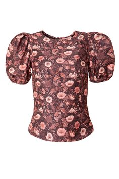 That's right! The Odette in Moody Floral also comes in a TOP! The perfect blend of playful and chic. Made with a brown woven fabric and accented with a neutral floral print, this top features a round neckline and short puff sleeves with elastic closures. The keyhole button and smocked back add unique details to this must-have fall piece. Pair with your favorite jeans to complete the outfit. Brown Floral Print Tops For Fall, Fitted Brown Floral Print Blouse, Elegant Brown Tops With Floral Print, Elegant Brown Floral Print Top, Fitted Brown Blouse With Floral Print, Elegant Floral Print Puff Sleeve Tops, Elegant Puff Sleeve Tops With Floral Print, Brown Printed Tops For Spring, Brown Fitted Puff Sleeve Top