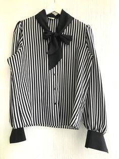 80s90s blouse striped ascot  Material stiffish polyester lightweight Bust  55cmx2 lengt 61cm size s m Chic Vertical Stripes Office Blouse, Chic Office Blouse With Vertical Stripes, Elegant Fall Blouse With Striped Collar, Chic Long Sleeve Blouse With Striped Sleeves, Chic Formal Blouse With Vertical Stripes, Elegant Striped Blouse For Fall, Elegant Office Blouse With Vertical Stripes, Elegant Striped Fall Blouse, Chic Blouse With Striped Collar For Fall