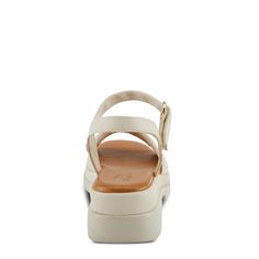 SPRING STEP Style: HUNTINGTON Indulge in unparalleled comfort and style with our buttery leather sandal featuring a platform, a memory foam insole for lasting cushioning, and a convenient hook and loop closure for effortless adjustability. Upper: Leather Lining: Leather Insole: Leather Outsole: Polyurethane Closure: Hook and Loop Heel Height: 2" Platform Height: 1" Features: - Memory Foam - Fit Recommendation: Fits true to size - The platform sole adds a trendy and chic element to your outfit, p Beige Open Toe Synthetic Sport Sandals, Summer Beige Leather Sport Sandals, Summer Leather Sport Sandals With Ortholite Insole, Beige Leather Sport Sandals For Summer, Comfortable Platform Slingback Sandals, Leather Sport Sandals With Ortholite Insole For Summer, Beige Open Toe Sport Sandals With Cushioned Footbed, Cream Leather Sandals With Arch Support, Beige Cushioned Open Toe Sport Sandals