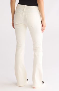 Flared bootcut jeans bring trend-right charm to your casual ensemble while the creamy-white wash enhances your look. 31 1/2" inseam; 9 1/2" front rise (size 26) 99% cotton, 1% spandex Machine wash, tumble dry Imported Cotton Flare Jeans With Flared Hem For Fall, Classic Cream Jeans For Spring, Casual Cotton Jeans With Flared Hem, Casual Flared Hem Cotton Jeans, Casual Cotton Flared Hem Jeans, Trendy White Mid-rise Flare Jeans, Casual Cream Flare Jeans For Spring, Beige Cotton Flare Jeans For Fall, Spring Beige Cotton Flare Jeans