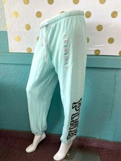 Victoria's Secret Pink Logo Classic Pant Sweatpants Mint Green New with tag Drawstring Waistband PINK by Victoria's Secret Classic Pant Logo print on one side Cinch Ankle Sweatpant Cozy Material SORRY, WE DO NOT SHIP INTERNATIONAL !!! Payment must be made within 3 days after Auction end Thank you Shipping Information US Shipping only : Shipping will be made by USPS First Class or Priority Mail, whichever is aprropriate according to the weight for inside of United States. Insurance: Optional at b Trendy Cotton Lounge Pants, Casual Cotton Bottoms By Victoria's Secret, Victoria's Secret Stretch Pants For Loungewear, Victoria's Secret Casual Cotton Bottoms, Victoria's Secret Stretch Loungewear Pants, Spring Loungewear Pants By Victoria's Secret, Victoria's Secret Loungewear Pants For Spring, Victoria's Secret Spring Loungewear Pants, Sporty Loungewear Bottoms From Victoria's Secret