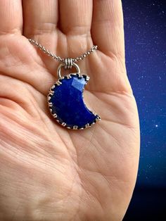 "Lapis Moon Pendant, Silver Moon Necklace, Silver Moon Pendant, Crescent Moon Gift, Blue Moon Pendant Offering a Lapis Moon Pendant set in sterling silver. A vibrant blue, faceted, crescent moon is hand set in decorative bezel wire and fabricated the old-fashioned way in my studio. The Lapis Moon is about an inch tall (the bail adds about .25\") and the crescent is about 18mm wide.  Every stone is unique and sizes may vary by a  millimeter or two! Perfect for the moon lover who loves celestial j Handmade Crescent Sterling Silver Jewelry, Moon-shaped Sterling Silver Jewelry With Natural Stones, Moon Shaped Sterling Silver Jewelry With Natural Stones, Unique Moon-shaped Sterling Silver Necklace, Sapphire Lapis Lazuli Jewelry With Faceted Details, Celestial Sterling Silver Necklaces With Natural Stones, Blue Gemstone Celestial Necklace, Sterling Silver Faceted Round Pendant Jewelry, Faceted Sterling Silver Round Pendant Jewelry