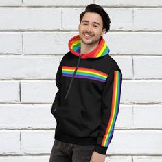 Show off your rainbow pride in this trendy black hoodie with rainbow flag stripes. You'll love how soft, warm and cozy it feels on. Perfect for all your adventures. STYLE GUIDE *Genderless pullover hoodie *Cozy and soft *Brushed fleece fabric inside *Double-lined hood with design on both sides MATERIAL 70% polyester / 27% cotton / 3% elastane 👉 Printed, cut & made to order Please check the Size Guide which can be found in the listing photos and check our FAQ's for further details regarding Rainbow Clothing, Pride Parade Outfit, Pride Hoodie, Rainbow Hoodie, Hippie Hoodie, Gay Outfit, Gay Pride Shirts, Rainbow Outfit, Gay Fashion