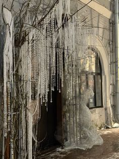 an old building with icicles hanging from it's windows