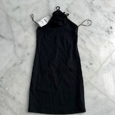 Zara Mini Black Dress With Flower Detail. Black Spring Halter Dress, Chic Black Mini Halter Dress, Black Formal Halter Dress For Summer, Formal Black Halter Dress For Summer, Chic Black Halter Mini Dress, Black Halter Mini Dress For Summer, Black Mini Halter Dress For Spring, Spring Black Halter Dress For Formal Occasions, Spring Formal Halter Neck Bodycon Dress