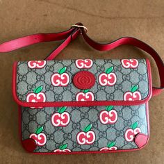 Authentic Gucci Gg Supreme Apple Belt Bag & Fanny Pack Red Leather Brand New, Unused. No Scratches Etc. I Am The Original Buyer And It Has Been Safely Stored. Pet Free Home And Well Sealed. Adjustable Strap, Inner Pockets Bag Height: 6.3 In./16cm Bag Width: 9.65 In./24.5cm Questions? Leave A Comment Below! Gucci Red Shoulder Bag For Everyday Use, Gucci Red Bag With Removable Pouch, Gucci Red Shoulder Bag With Removable Pouch, Gucci Red Shoulder Bag For Travel, Vintage Gucci Bag With Removable Pouch, Vintage Gucci Shoulder Bag With Removable Pouch, Gucci Fanny Pack, Gucci Disco, Baking Measurements