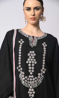 Introducing our enchanting 3-piece Salwar Kameez with Dupatta set, where traditional craftsmanship meets contemporary style. This set features stunning machine embroidery adorned with delicate sequins work, adding a touch of glamour and sophistication to your ensemble. Each piece is meticulously crafted to perfection, ensuring that every stitch and detail exudes elegance and charm. Whether you're attending a festive celebration or a formal event, this Salwar Kameez set promises to elevate your look with its timeless appeal and exquisite craftsmanship. Experience the epitome of luxury and grace with our 3-piece Salwar Kameez set, designed to make you shine on every occasion. Size & Fit Model height is 5’9’ and is wearing a Small sizeMaterial & CareMaterial: Rayon Care: Gentle machine wash i Unstitched Palazzo Set With Resham Embroidery And Straight Kurta, Straight Kurta Salwar Kameez With Embroidered Border, Designer Palazzo Set With Embroidered Border, Bollywood Style Sets With Resham Embroidery And Straight Kurta, Festive Straight Kurta Sets With Embroidered Border, Diwali Embroidered Palazzo Set With Straight Kurta, Navratri Straight Kurta Palazzo Set With Embroidered Border, Navratri Palazzo Set With Embroidered Border And Straight Kurta, Designer Straight Kurta Sets With Embroidered Border