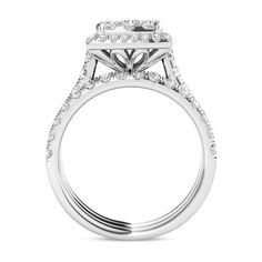 Wow her with this captivating diamond bridal set. Crafted in cool 14K white gold, the engagement ring features a 1/8 ct. diamond at its center, wrapped in two squared frames of shimmering diamonds. Sparkling diamonds also line the ring’s slender shank. On your special day, two coordinating diamond-lined wedding bands complete this breathtaking ensemble. Radiant with 2 cts. t.w. of diamonds and a bright polished shine, this bridal set is an elegant gift for the woman you love. Diamond Bridal Sets, Bridal Set, Square Frame, Sparkle Diamonds, Bridal Sets, Elegant Gift, Square Frames, Eternity Ring, Wedding Bands