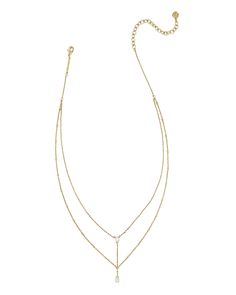 Say howdy to the Wrangler® x Yellow Rose by Kendra Scott Laurel Vintage Gold Multi Strand Necklace in Ivory Mother of Pearl. Featuring a lariat-style necklace accented with beautiful stones and a second chain with metal bar stations, this necklace is a subtle statement perfect for cowgirls anywhere. Plus, the chains are connected, which means you get all the style without any of the hassle. This necklace is a part of the Wrangler® x Yellow Rose by Kendra Scott collection, a limited-edition colla Lariat Style Necklace, Beautiful Stones, Mother Of Pearl Necklace, Metal Bar, Multi Strand Necklace, Style Necklace, Yellow Roses, Strand Necklace, Yellow Rose