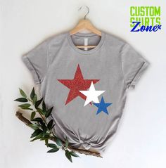 "4th of July womens Shirt,USA Star Shirt,4th of July Shirt,4th of July Red White Blue Stars,patriotic shirt,Independence Day,USA Star Tee 🎁 Enjoy your shopping ! Need custom made shirts? Don't hesitate to message us! Thanks for your support! CustomShirtsZone_ Family ----- How To Order ----- 1-) Please, check and review all the photos. 2-) Choose your t-shirt size and color. *Different styles of shirts may have different shades of same color choice due to different manufacturer brands. *For this Patriotic Short Sleeve T-shirt With Star Print, Patriotic Star Print Short Sleeve T-shirt, Casual Star Print Tops For Independence Day, Casual Tops With Star Print For Independence Day, Casual Independence Day Tops With Star Print, Patriotic Pre-shrunk Shirt For 4th Of July, Patriotic Red Tops With Star Print, Red Short Sleeve Top With Star Print, Patriotic Red Star Print Top