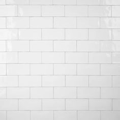 a white brick wall that is very clean