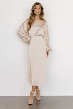 Nessa Lace Midi Dress | Blush | Baltic Born Cream Dress With Sleeves, Beige Dress Long Sleeve, Long Sleeve Champagne Bridesmaid Dress, Modest Cream Bridesmaid Dresses, Champagne Rehearsal Dinner Dress, Winter Engagement Photo Dress, Mid Length Mother Of The Bride Dresses, Timeless Business Casual, Modest Champagne Bridesmaid Dresses