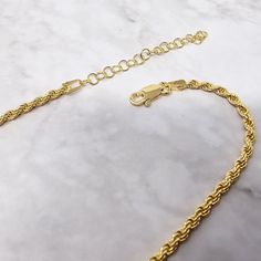 The rope chain necklace is an effortless essential. Dipped in gold, it provides you with affordable every day luxury.  This eye catching piece combines high quality craftsmanship and precious metal without the hefty price tag. Ethically-sourced and affordable, so you can look as good as you feel, every day.  This jewellery arrives beautifully packaged and ready to gift. It would make a really thoughtful and meaningful birthday gift, Christmas gift, Mother's Day gift, Valentine's Day gift, annive Minimalist Rope Chain Link Jewelry, 14k Gold Rope Chain Luxury Necklace, Minimalist Gold-plated Rope Chain Necklace, Minimalist Gold Plated Rope Chain Necklace, Luxury Gold-plated Rope Chain Jewelry, Yellow Gold Rope Chain Necklace For Everyday, Elegant Gold Rope Chain Necklace, Elegant 14k Gold Tarnish Resistant Rope Chain Necklace, Yellow Gold Plated Rope Chain Necklace