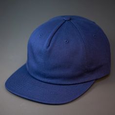 An Unstructured, 100% Premium Cotton, Blank Pinch Front Hat With a Premium Leather Back Strap & Brass Clasp. One of our teams favorite pieces, this unassuming, unstructured pinch front 5 panel is one for the ages. Constructed from a sturdy, medium weight, 100% Cotton base and finished with a premium leather strap & Brass Clasp. We designed the ROAM Strapback for the adventurer in all of us. Custom Roam Strapback Hat in Navy | Cotton | Apparel | Headwear | Baseball Caps Solid Color Snapback Hat With Flat Bill For Streetwear, Solid Color Snapback Fitted Hat For Streetwear, Cotton Snapback Trucker Hat, Adjustable Six-panel Snapback Hat For Baseball Season, Adjustable Six-panel Snapback For Baseball Season, Cotton Flat Brim Dad Hat For Sports, Flat Brim Cotton Dad Hat For Sports, Classic Snapback Baseball Cap For Sports Events, Solid Cotton Snapback Hat For Streetwear