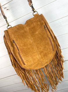 Leather Hobo Bag With Zipper Closure For Fall, Bohemian Shoulder Bag With Tassels For Fall, Brown Fringe Bag For Fall, Bohemian Fall Bags With Tassels, Brown Suede Shoulder Bag For Fall, Fall Fringe Hobo Shoulder Bag, Fall Tassel Crossbody Shoulder Bag, Fall Crossbody Shoulder Bag With Tassels, Fall Fringe Leather Bags