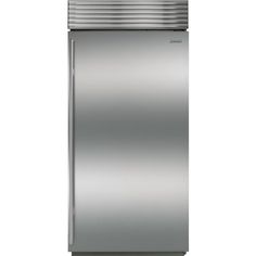 a silver refrigerator freezer sitting on top of a white wall