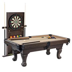 a pool table with two cues and a dart