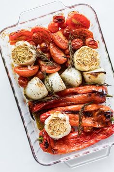 A glass pan of roasted vegetables for making roasted red pepper soup. royalty free stock images Roasted Red Pepper Soup, Soup Stock, Red Pepper Soup, Glass Pan, Pepper Soup, Roasted Red Pepper, Stuffed Pepper Soup, Roasted Red Peppers, Roasting Pan