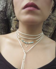 "Boho Hamsa Necklace, Yoga Jewelry, Delicate Choker Necklace, Gold Wrap Necklace, Minimalist Wrap Choker, Suede Choker, Boho Tie Up Necklace ❤ BUY ANY 2 ITEMS ANS GET 15% OFF!! (USE COUPON CODE '15OFF') ❤ ❤ BUY ANY 4 ITEMS ANS GET 20% OFF!! (USE COUPON CODE '20OFF') ❤ ❤ BUY ANY 6 ITEMS AND GET 25% OFF!! ((USE COUPON CODE '25OFF') ❤ Complete any outfit with this unique gorgeous fashionable and trendy delicate Hamsa choker wrap necklace ! Made from one long 3x1mm suede leather cord, 6mm faceted ro Adjustable Minimalist Layered Choker Necklace, White Adjustable Chain Layered Choker Necklace, White Adjustable Choker Layered Necklace, White Choker Layered Necklace With Adjustable Chain, White Layered Choker Necklace With Adjustable Chain, Delicate Adjustable Everyday Choker, Minimalist Adjustable Layered Clavicle Necklace, Minimalist Adjustable Long Layered Necklace, Minimalist Long Adjustable Layered Necklace