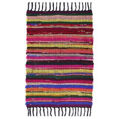 a multicolored rug with fringes on it