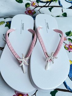 This beautiful flip flops is hand wrapped with a matte mauve ribbon and adorned silver starfish with rhinestones. Ribbon color is chalk mauve , if you are needing other colors of ribbon or decoration please contact me and will be happy to accommodate you! All flip flops are handmade to order and the production time is 5-7 business days and then please allow additional time for shipping. Amazing for beach, weddings, flower girl or a fancy event, you choose! Please choose your size from the drop b Silver Round Toe Flip Flops For Vacation, Silver Flip Flops For The Beach, Silver Open Toe Flip Flops For Beach, Silver Summer Beach Sandals, Adjustable Silver Flip Flops, Adjustable Silver Open Toe Flip Flops, Adjustable Open Toe Flip Flops For Beach Wedding, Beach Wedding Flip Flops, Bride Flip Flops