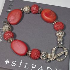 Hard To Find Silpada Fiery Red Coral, Cinnabar And Sterling Silver Bead Bracelet With A Toggle Clasp Silpada Jewelry Item #B0985. Measures Approx. 8 3/8" Total Length. As With Many Of The Early Silpada Pieces, It Was Not Marked With The Silpada Logo. .925 Sterling Silver, Coral, Cinnabar Pre-Owned Condition. The Bracelet Pictured Is The One You Will Receive. Securely Packaged In Generic Materials. Sterling Silver Bead Bracelet, Silpada Jewelry, Silver Bead Bracelet, Fiery Red, Silver Bead, Toggle Clasp, Red Coral, Sterling Silver Bead, Bead Bracelet