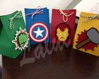 some avengers themed bags are sitting on a table