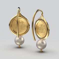 Discover timeless elegance with our Owl of Athena Gold Coin Earrings, available in 14k or 18k gold. Expertly crafted in Italy by Oltremare Gioielli, these exquisite Italian jewelry pieces showcase a captivating blend of ancient symbolism and modern design. Adorned with a lustrous White Akoya Pearl and featuring gold hook closures, these earrings are a symbol of wisdom and beauty. Elevate your style with the allure of craftsmanship and sophistication. Earrings size: 25mm Length, 12 mm width 6mm / Refined 14k Gold Earrings For Anniversary, Classic Yellow Gold Earrings For Formal Occasions, Luxury Oval Pearl Earrings, Elegant Earrings With Timeless Design, Elegant Oval Hallmarked Earrings, Timeless Design Round Earrings For Gift, Luxury Formal Earrings With Timeless Design, Classic White Gold Earrings With Timeless Design, Classic White Gold Earrings