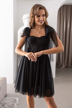 Fitted Black Evening Dress For Wedding Guest, Black Tulle Mini Dress For Prom Season, Summer Evening Tulle Bridesmaid Dress, Black Party Dresses With Tulle Skirt, Sweetheart Neckline Tutu Dress For Party, Black Tulle Corset Dress For Summer, Black Mini Dress With Fitted Bodice For Wedding, Party Tutu Dress With Sweetheart Neckline, Black Tulle Dress With Sweetheart Neckline