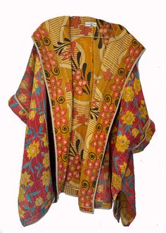 Made from a vintage Kantha quilt, this wrap design is the perfect layer for any season. It’s simple sophistication highlights both the artistic beauty of the heirloom textile and unassuming allure of Kantha’s cherished ancient roots. Protection, warmth and comfort wrapped in a one-of-a-kind sustainable statement piece. Product Description: * Generous overlap requires no closure * Intentionally unlined so you can experience the equally unique inside * Double cuff arm holes for easy arm access * D Etnic Style, Quilt Coats, Bohemian Clothes Women, Denim Projects, Double Cuff, Concept Clothing, Indian Textiles, Layered Fashion, Clothing And Textile