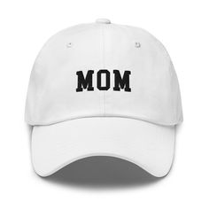 "Mom Embroidered Cap, Mom Baseball Cap, Mom Dad Hat, Gift for Moms, Mothers Day Gift, Mom Caps, New Moms, Baby Announcement Hat, Mom  * 100% chino cotton twill * Green Camo color is 35% chino cotton twill, 65% polyester * Unstructured, 6-panel, low-profile * 6 embroidered eyelets * 3 ⅛\" (7.6 cm) crown * Adjustable strap with antique buckle Here's the matching Daddy hat:  https://www.etsy.com/listing/1028341061/daddy-hat-daddy-baseball-cap-daddy Here's the Mommy hat: https://www.etsy.com/listing/1028347753/mommy-hat-mommy-dad-hat-mom-baseball-hat ORDER PROCESSING AND SHIPPING: Your cap is embroidered and shipped out within 2-7 business days. Shipping can take an additional 3-5 business days. Buy 2 or more for FREE SHIPPING! CANCELLATIONS, EXCHANGES, and REFUNDS: - You may cancel your order White Dad Hat Baseball Cap With Letter Print, Personalized Cotton Birthday Hat, White Baseball Cap Dad Hat With Letter Print, White Dad Hat With Letter Print, White Cotton Dad Hat With Letter Embroidery, White Trucker Hat With Letter Print Visor, White Baseball Cap With Letter Print, Personalized White Cotton Hat, White Personalized Cotton Hat