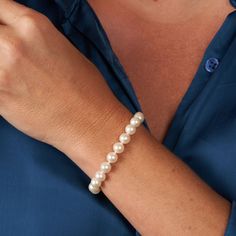 If you are looking for something easy and simple for yourself or a gift for someone special, this may be the perfect piece for you. This lovely bracelet is composed of 7.5-8.0 mm AAA quality freshwater pearls. These fine quality round pearls have a white body color and brilliant, rich overtones, with a smooth, lustrous surface. The pearls are individually hand-knotted on silk thread so that no two pearls ever rub against each other, and if the bracelet ever snaps, you won't lose a single pearl. Single Pearl, Clasp Bracelet, Freshwater Pearl Bracelet, Elegant Bracelet, White Freshwater Pearl, Pearl Types, Body Color, Bracelet Clasps, Pearl Color