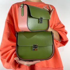 This bag, like all the others, uses our original ideas and handicrafts  Our quality is always higher than the price, see for yourself. One of the variations of the popular saddle bag model for women. Made of smooth high quality Italian Mastrotto leather in an organic combination of olive green and pink. Eco leather lining (inside). Luxurious quality. One spacious interior compartment with a zip closure. Inside there is a pocket for your phone and small items. Comes with a comfortable, wide 120 c Trendy Leather Bags, Leather Saddle Bags, Popular Bags, Bag Model, Bag Green, Green And Pink, Saddle Bag, Shoulder Tote, Green Leather