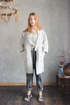 "Welcome to Pavietra! This oversized linen jacket is handmade to order in your choice of 20 gorgeous colors. Made of organic linen, it features a kimono style, deep front pockets, and 3/4 sleeves. This classical jacket can easily go from season to season, and it a wardrobe staple you will wear year after year. JACKET DETAILS ⚬ Back length from shoulder is about 37\" (94 cm). (* ) If you would like to add or subtract 10cm from the length, just let us know. ⚬ Kimono cut. ⚬ No closure. ⚬ 3/4 sleeve Casual Linen Kimono With Relaxed Fit, Bohemian Linen Outerwear With Pockets, Spring Linen Cardigan With Pockets, Spring Relaxed Fit Ramie Outerwear, Casual Linen Kimono For Spring, Spring Casual Linen Kimono, Relaxed Fit Long Sleeve Kimono With Pockets, Long Sleeve Kimono With Pockets And Relaxed Fit, Relaxed Fit Linen Cardigan With Pockets