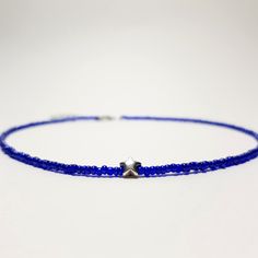 Blue choker necklace Dainty choker Star beaded necklace choker Beach choker Boho necklace Choker collar Silver star necklace choker The glass beaded star choker is 13 inches and can be adjusted up to 15 inches with a 2 inches extender chain. Made from 2mm tiny glass seed beads. This necklace has a dainty look and is crafted sturdy enough to wear every day. Every piece is made to order with care and love. ✓ HOW TO ORDER: ♥ Choose the color of your choice ♥ Choose the size of your choice ♥ If you Adjustable Star Charm Necklace For Summer, Adjustable Blue Beaded Star Necklaces, Trendy Blue Choker With Tiny Beads, Adjustable Blue Star-shaped Beaded Necklace, Blue Adjustable Star-shaped Beaded Necklaces, Minimalist Blue Beaded Choker Necklaces, Minimalist Blue Beaded Choker Necklace, Blue Star-shaped Adjustable Necklace, Adjustable Star Choker For Festival