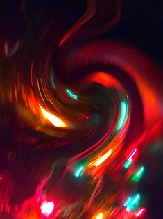 blurry photograph of colorful lights in the dark