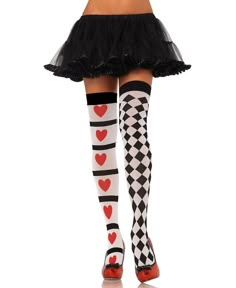 a woman in black and white tights with hearts on them