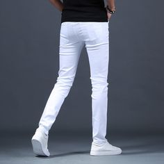 Trendy Slim Fit Bottoms For Streetwear, Slim Stretch Cotton Bottoms, Casual Stretch White Pants, White Stretch Jeans For Spring, Spring White Stretch Jeans, Slim Fit Cotton Jeans For Streetwear, Slim Cotton Pants With Pockets, Slim Fit Cotton Jeans For Summer, Slim Fit Cotton Pants For Summer