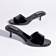 Named for femme fatale Greta Garbo, this versatile mule is festive and functional, in neutral black patent leather you can wear with everything this Summer. Elegant Patent Leather Mules For Parties, Party Mules With Padded Heel In Patent Leather, Party Patent Leather Mules With Padded Heel, Sleek Mules For Spring Evening, Sleek Mules For Spring Cocktail Events, Sleek Mules For Spring Cocktail, Sleek Cocktail Mules For Spring, Sleek Spring Cocktail Mules, Evening Patent Leather Open Heel Mules